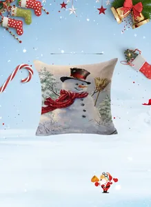 Close-up of linen Christmas pillowcase featuring a snowman with red scarf and hat