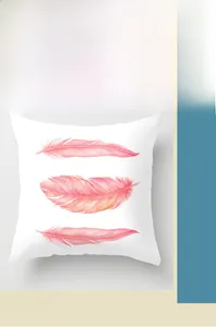 Detailed view of square pillowcase with pink feather digital print on white fabric