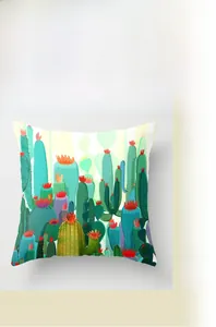 Detailed macro view of tropical cactus print on square pillowcase with vibrant red flowers