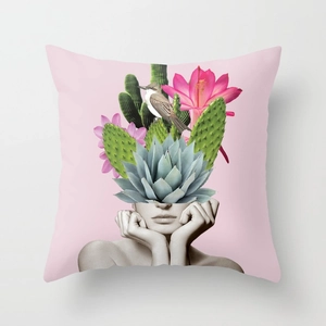 Artistic cushion cover featuring a surrealist floral portrait on a soft pink background