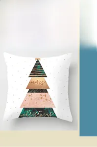 Detail of Nordic Christmas tree pillowcase featuring gold glitter and peach skin texture