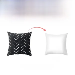 Detail showing the front geometric pattern and solid white back of this pillow cover