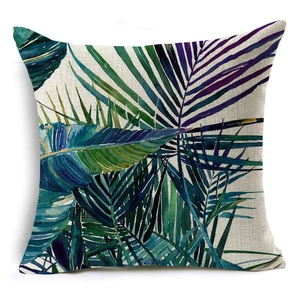 Square linen pillowcase featuring a tropical palm leaf pattern on a white background