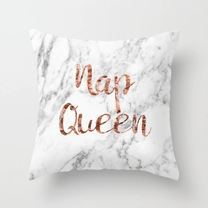 Detail of marble pattern cushion cover with rose gold foil Nap Queen lettering