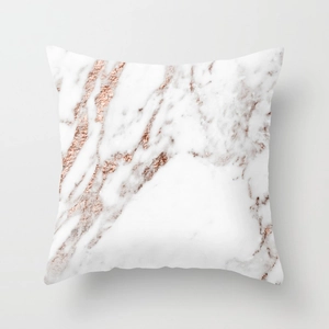 Detail of modern marble texture pillowcase with elegant rose gold metallic veins