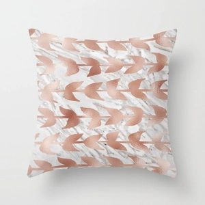 Macro detail of marble pattern and rose gold leaf foil print on square pillow cover