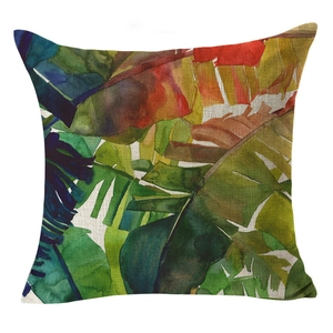 Tropical linen throw pillow cover featuring vibrant watercolor flamingo and hibiscus leaves