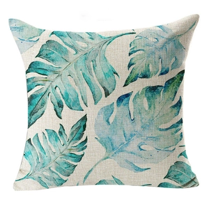 Tropical monstera leaf print linen pillow cover in teal and beige for home decor
