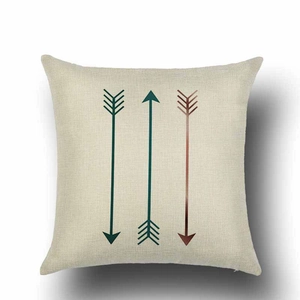 Detailed close-up of blue linen cushion cover with geometric arrow pattern and fabric texture