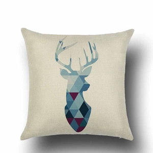 Macro detail of geometric elk head pattern on square blue linen decorative pillow cover