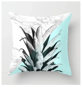 Detail of square pillowcase with pineapple leaf design and marble geometric pattern