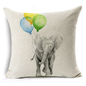 Detailed macro view of the natural linen texture and painted elephant with balloons on pillowcase