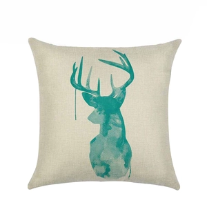 Nordic style linen pillowcase featuring a teal watercolor stag deer head silhouette