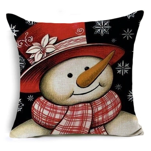 Detailed texture of Christmas linen pillowcase featuring a snowman with a red hat and scarf