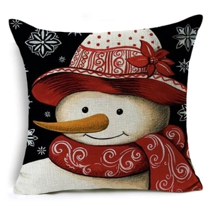 Detailed macro texture of a linen Christmas snowman pillow cover with snowflake patterns