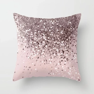 Close-up of pink decorative pillowcase with rose gold gradient glitter pattern