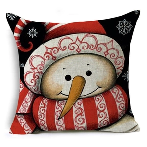 Close-up detail of linen texture on Christmas pillowcase with snowman pattern
