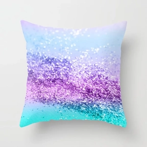 Detail of square pillowcase with purple and cyan gradient glitter sequin pattern texture