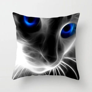 Macro detail of artistic cat face pillowcase with glowing lines and blue eyes