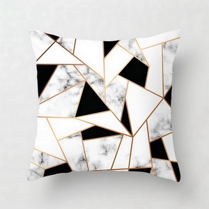 Close-up of pink marble pattern geometry on soft peach skin pillowcase with gold lines