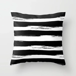Detailed view of square pillowcase with artistic black and white hand-painted stripes