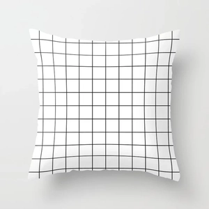 Detailed close-up of a minimalist white and black grid linen texture throw pillow cover