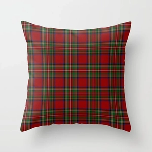 Close-up of red tartan plaid linen pillow cover showing woven fabric texture and stitching