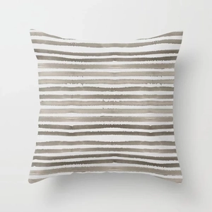 Macro view showing the watercolor striped texture on polyester peach skin pillowcase