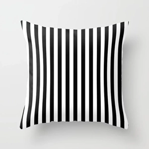 Close-up of black and white vertical striped pillowcase with soft polyester texture