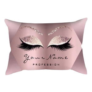Customizable pink eyelash lumbar pillow cover with glitter details on white background