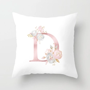 Detail of pink letter D and roses on soft white peach skin polyester pillowcase