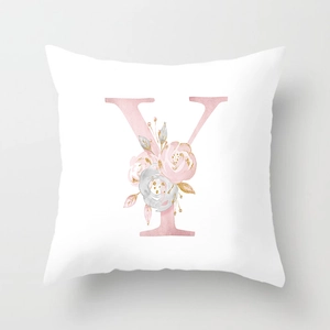 Detail of white peach skin pillowcase with floral letter Y in rose gold finish