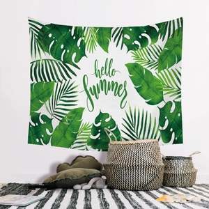 Nordic style tapestry with green tropical leaves and hello summer print on white wall