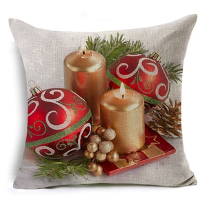 Linen Christmas pillow case featuring festive candles pine needles and ornaments