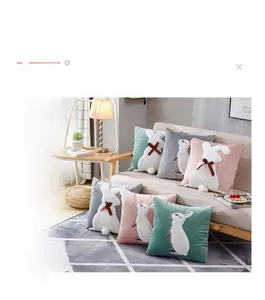 Detail showing plush rabbit applique and soft texture on colorful throw pillow covers