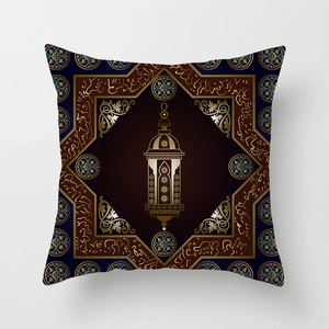 Detail of blue pillow cover with golden Fanous lantern and Arabic calligraphy art