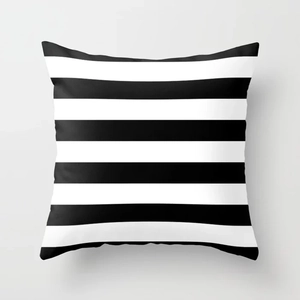 Close-up of minimalist square cushion cover with classic black and white horizontal stripes