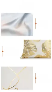 Detail of white pillowcase with golden foil leaf pattern and premium stitching quality