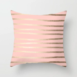 Pink and metallic gold striped geometric cushion cover in a modern square layout