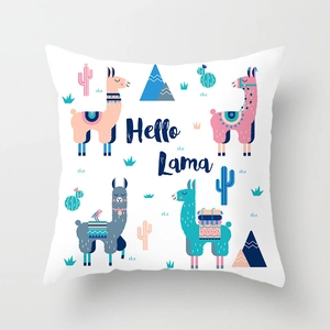 Detailed close-up of a white alpaca pattern cushion cover with Hello Lama text art