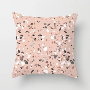 Detailed view of pink marble terrazzo pattern with rose gold flakes on square cushion cover