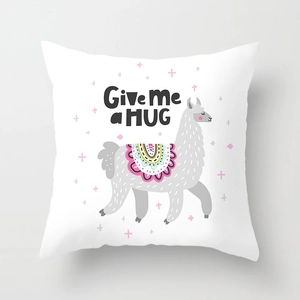 Detail of white square cushion cover with cartoon llama and 'Give Me a HUG' art print