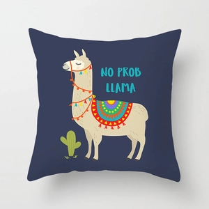 Detail of square navy pillow cover with cartoon llama, cactus and No Prob Llama text