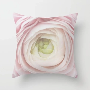 Detail of floral pillow case with soft pink ranunculus print on premium soft fabric