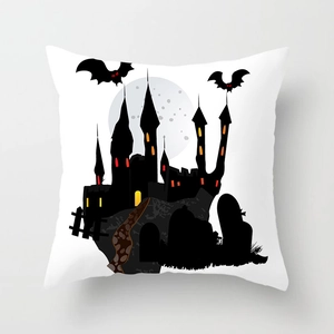 Detail of Halloween pillowcase featuring black castle, bats and moon on peach skin fabric