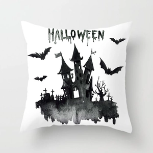 Detail of Halloween pillowcase featuring ink-style castle and bats on white fabric