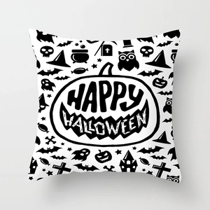 Detailed view of Halloween pillowcase with black and white pumpkin and ghost prints