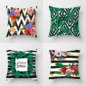 Set of four tropical plant and floral peach skin pillow covers with geometric patterns