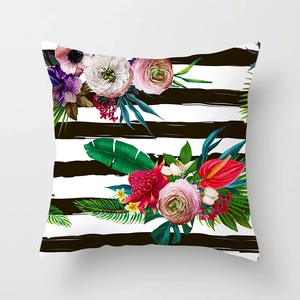 Detailed macro view of tropical floral print on peach skin pillowcase fabric texture