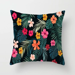 Detail of tropical peach skin pillowcase with hibiscus flowers and palm leaf patterns